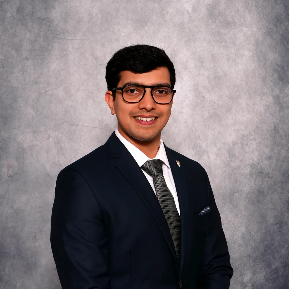 Professional headshot of Varad Parte